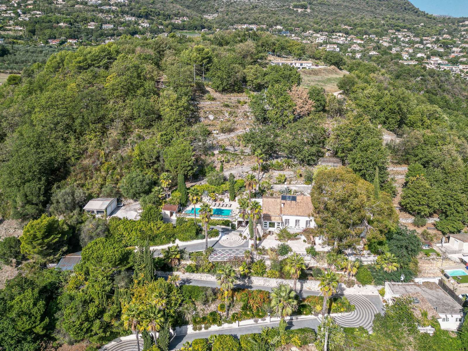 Elegant Estate with Panoramic Views and Private Tennis Court